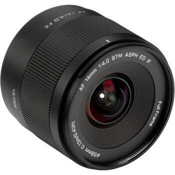 Black wide-angle camera lens with red glass elements visible through front aperture.