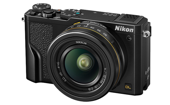 Nikon DL compact camera with fixed lens, shown in three-quarter view against white background.