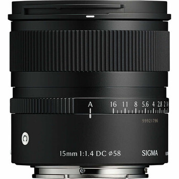 Sigma 15mm f/1.4 DC HSM prime lens with aperture ring and focus scale visible.