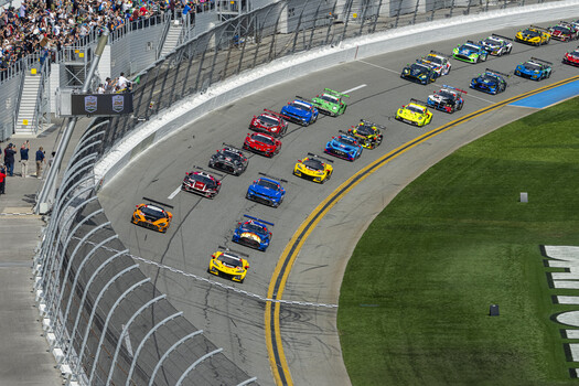The green flag waves at the GTD class cars cross the start line for the 2026 Rolex 24 at Daytona