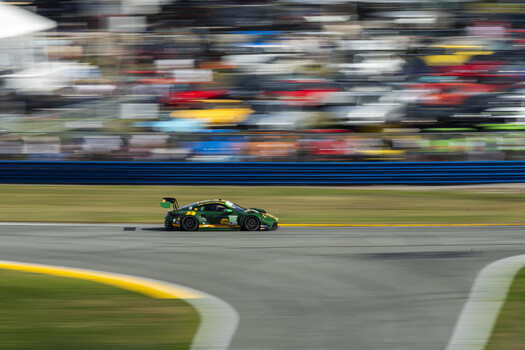 The No. 120 Wright Motorsports car approaches turn four at Daytona