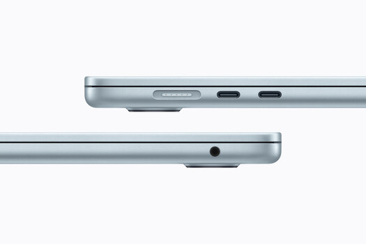 Close-up of two silver tablet edges showing ports and buttons in side-by-side comparison.