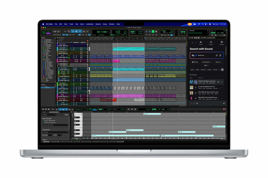 Screenshot of a digital audio workstation displaying multiple music tracks with colorful waveforms and MIDI clips on a laptop screen.