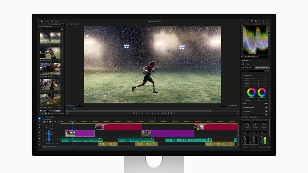 Screenshot of professional video editing software showing a football player in rain with timeline and color correction tools.