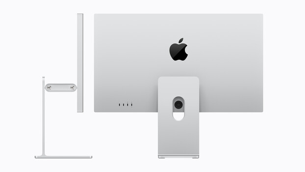 Rear view of a silver Apple iMac 24-inch display with stand and cable management visible.