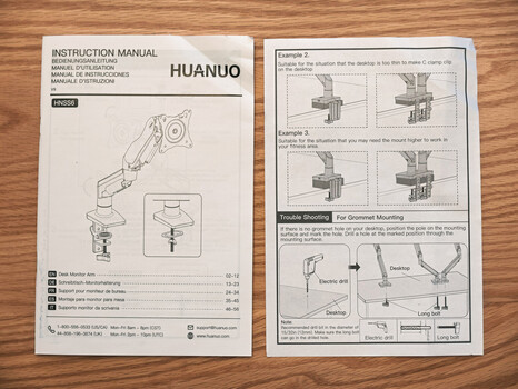 Huanuo FlowLift™ Single Monitor Mount (SS6 / HNSS6) owner's manual, which has excellent assembly instructions.