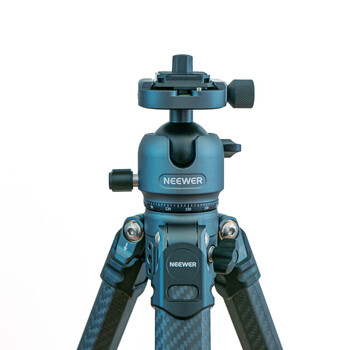 Neewer ball head tripod with blue and black finish mounted on carbon fiber legs.