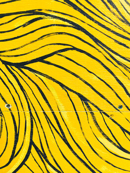 Abstract illustration of flowing black curved lines on bright yellow background.