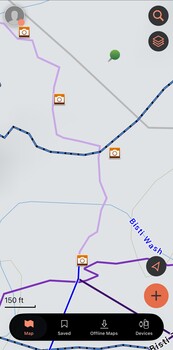 Screenshot of mobile navigation app showing purple route with multiple waypoints and controls