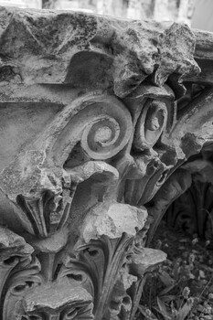 Part of an ornately carved marble pillar at the Acropolis in Athens.