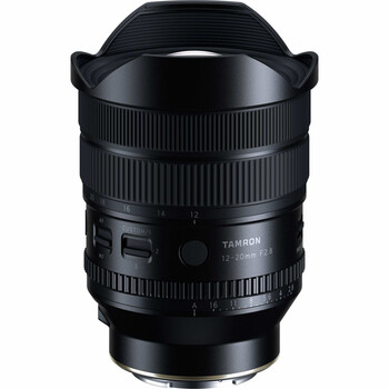 Tamron ultra-wide angle lens with lens hood against white background