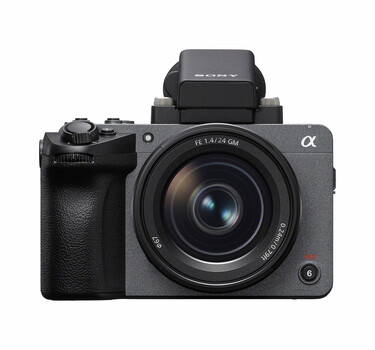 Sony Alpha mirrorless camera with 28mm lens and flash attachment mounted on top
