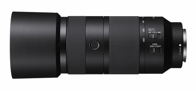 Sony E-mount telephoto zoom lens with focus ring and AF/MF switch visible
