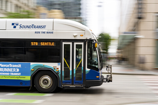 Sound Transit bus in motion with motion blur effect on urban street