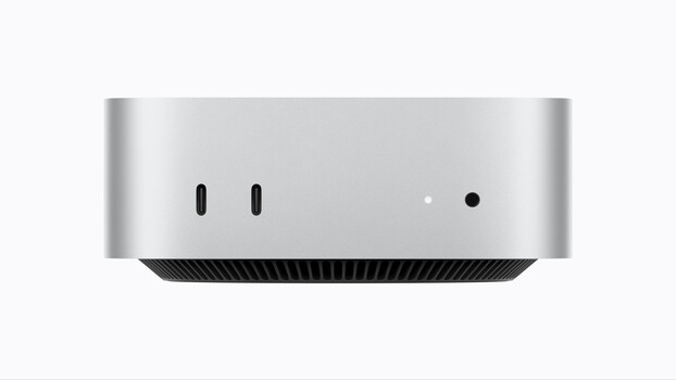 Top view of a silver Mac mini computer showing two Thunderbolt ports and indicator lights