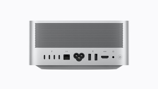 Mac Studio desktop computer with front-facing ports and controls visible