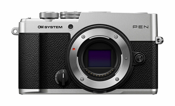 OM System Pen mirrorless camera body with silver and black finish