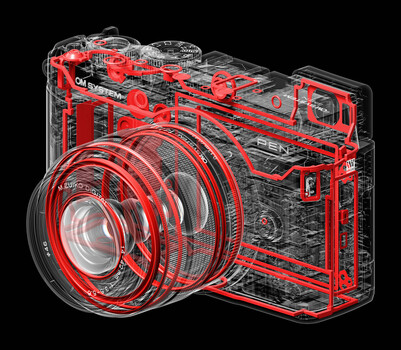 X-ray style illustration of a compact digital camera with red internal components highlighted against dark background