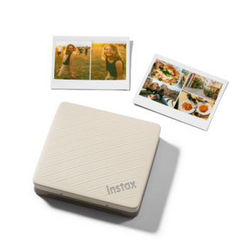Instax printer with instant photo prints displayed above