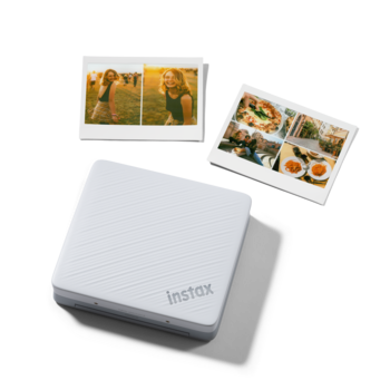 Instax printer with sample photo prints displayed above showing instant photo outputs
