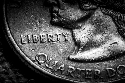 Image "Macro quarter" by Jon Sullivan