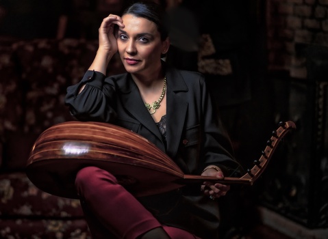 Image "Oudi-oud player" by Tanil Esemenli