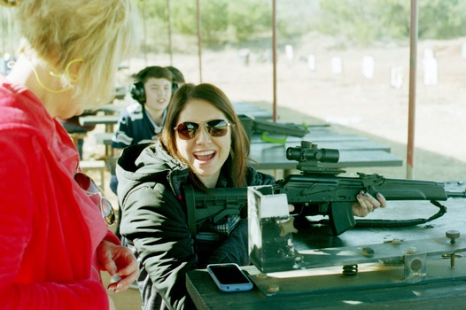 Image "Krissy likes pulling the trigger" by Damon Bell