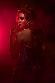 Image "The Devil wears temptation. Beautiful. Dangerous. Unforgettable" by Dexter Maneja