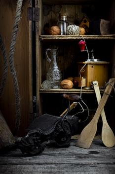 Image "Vintage kitchen cabinet with appliances, utensils, jars and coffee grinder" by Aleksandar Ilic