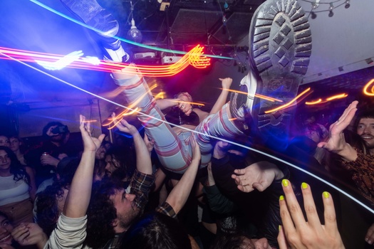 Image "Crowd Surfer" by Brian L
