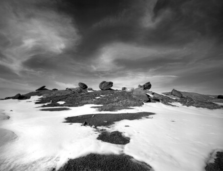 Image "Snowy Ridge and Rocks, the Black Place" by Nathan McCreery