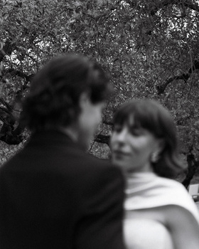 Image "BRIDE AND GROOM UNDER OLIVE TREE" by Jordi Dalmau