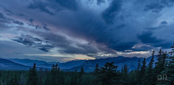 Image "Storm Clouds in the Rockies" by Rod Pike