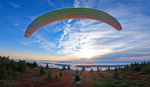 How One Photographer Paraglided a 4,700 Ft Mountain to Create Breathtaking Autumn Photos and Videos
