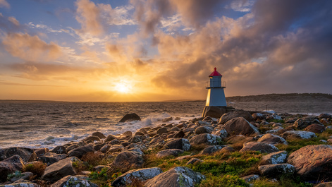 Sunset at the lighthouse by Hans Jørgen Lindeløff