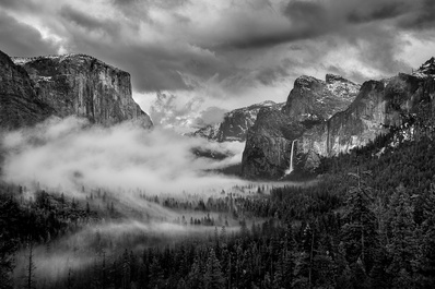Clouds flow through tunnel view by Cheryl Lalonde