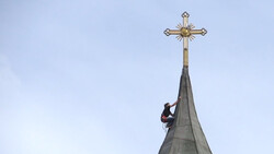 Rock Climber Scales Church To Retrieve Stuck Camera Drone