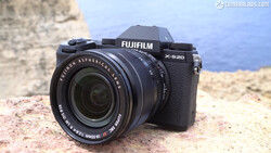 Fujifilm X-S20 mirrorless camera with Fujinon 18-55mm lens on rocky terrain.