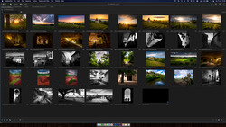 Screenshot of photo library management software displaying a grid of landscape and architectural photographs.