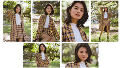 Young woman wearing a yellow and brown plaid shirt over a white tee in an outdoor setting.