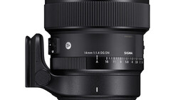 Sigma 14mm f/1.8 DG HSM Art lens with hood attached, shown against white background.