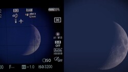 Screenshot of camera display showing moon photography settings and live view with exposure data.