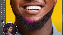 Screenshot of photo editing software showing a close-up portrait with selective color adjustments on the beard area.