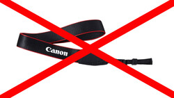 Canon camera strap with red X marks overlaid across the image.
