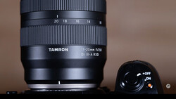 Tamron 11-20mm f/2.8 Di III-A RXD lens with focus ring and depth-of-field scale visible.