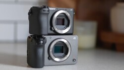 Two Sony Alpha mirrorless camera bodies stacked vertically, showing their sensor areas and lens mounts.