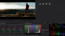 Screenshot of color grading interface showing waveform, histogram, and color wheels during post-processing workflow.