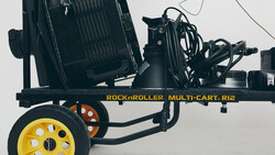 Rock n Roller Multi-Cart Rie equipment cart with yellow wheel and coiled cables on white background.