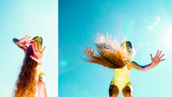 Two images of a person with long hair photographed against blue sky, one profile shot with arms raised, one action shot with hair in motion.