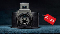 Vintage twin-lens reflex camera with a red price tag marked $40.00 attached to its side.